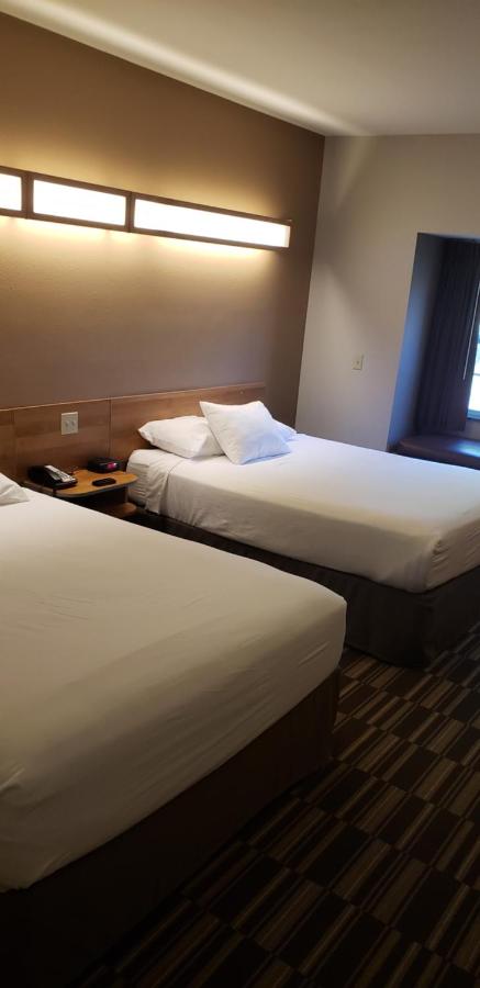 Deluxe Queen Room with Two Queen Beds - Non-Smoking at Microtel Inn & Suites by Wyndham York