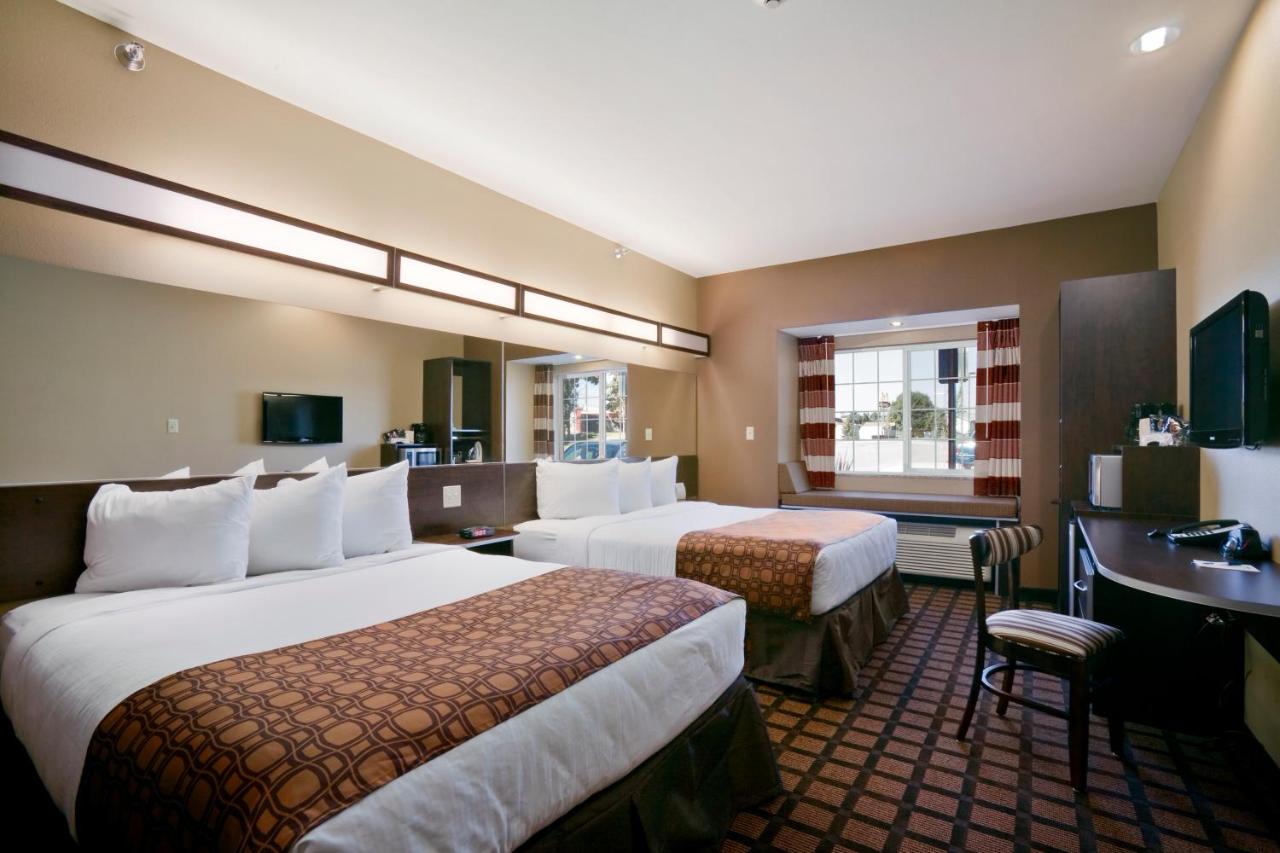Queen Room with Two Queen Beds and Bath Tub - Mobility Accessible/Non-Smoking at Microtel Inn & Suites by Wyndham Sidney