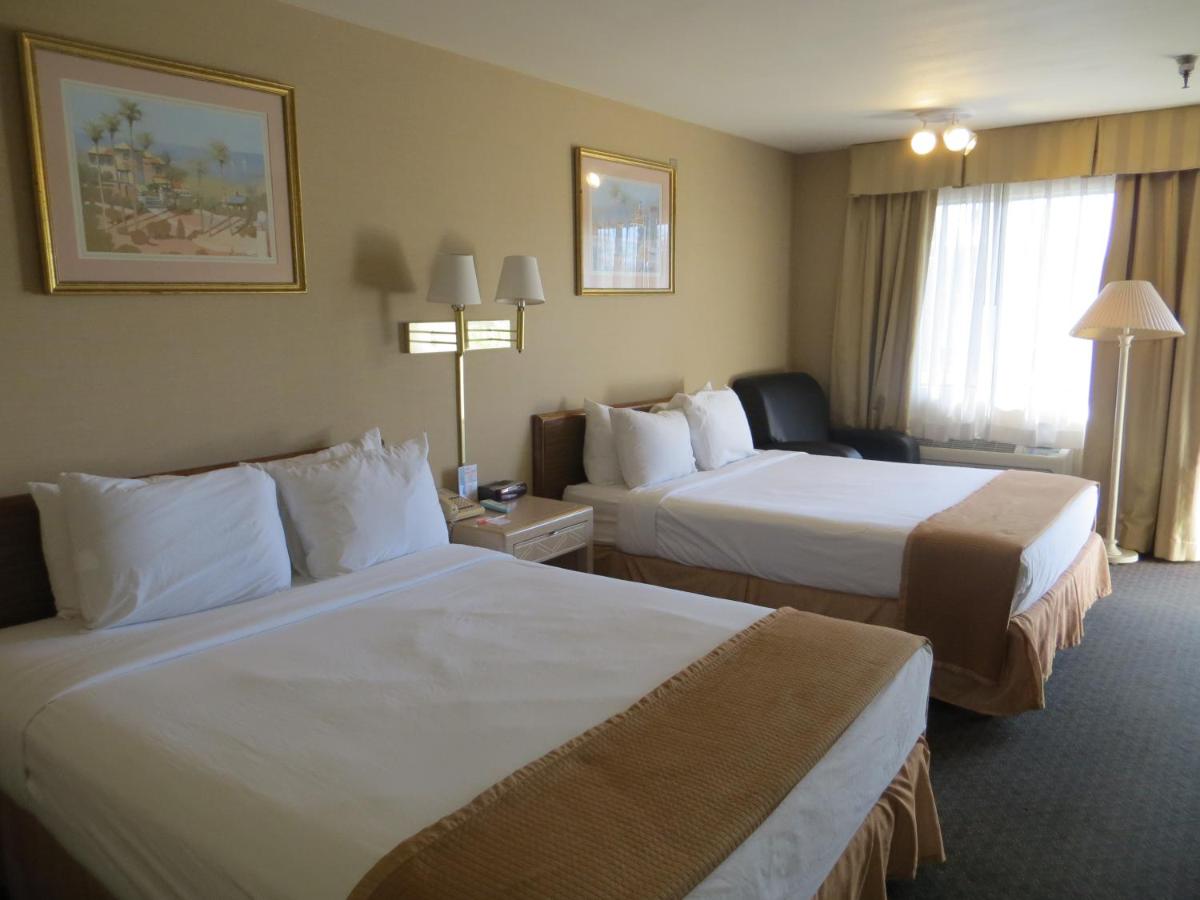 Queen Room with Two Queen Beds - Non-Smoking at Howard Johnson by Wyndham Torrance