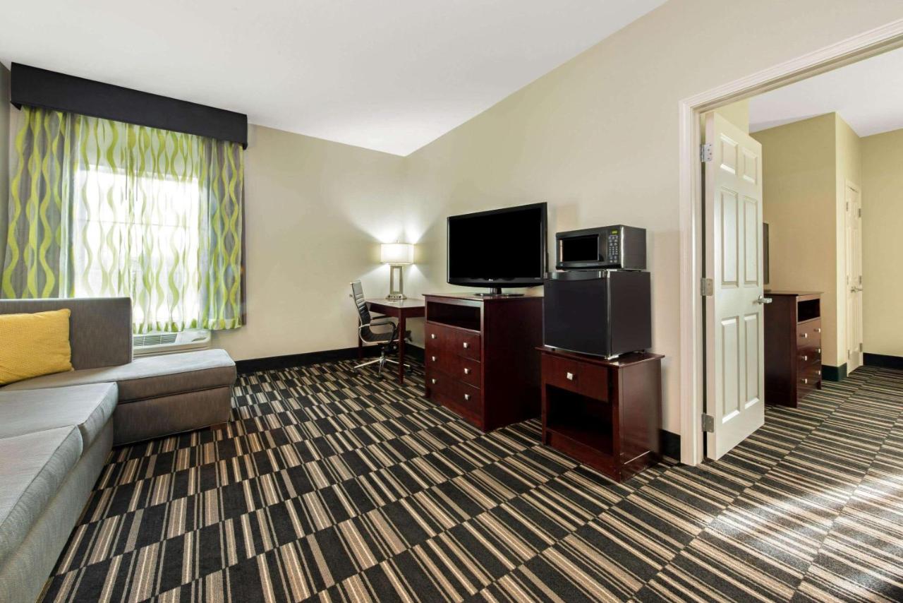 Deluxe King Suite with Lake View - Non-Smoking at La Quinta Inn & Suites by Wyndham Bridge City