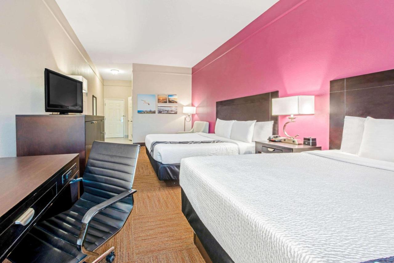 Deluxe King Room with Two King Beds - Non-Smoking at La Quinta Inn & Suites by Wyndham Winnie