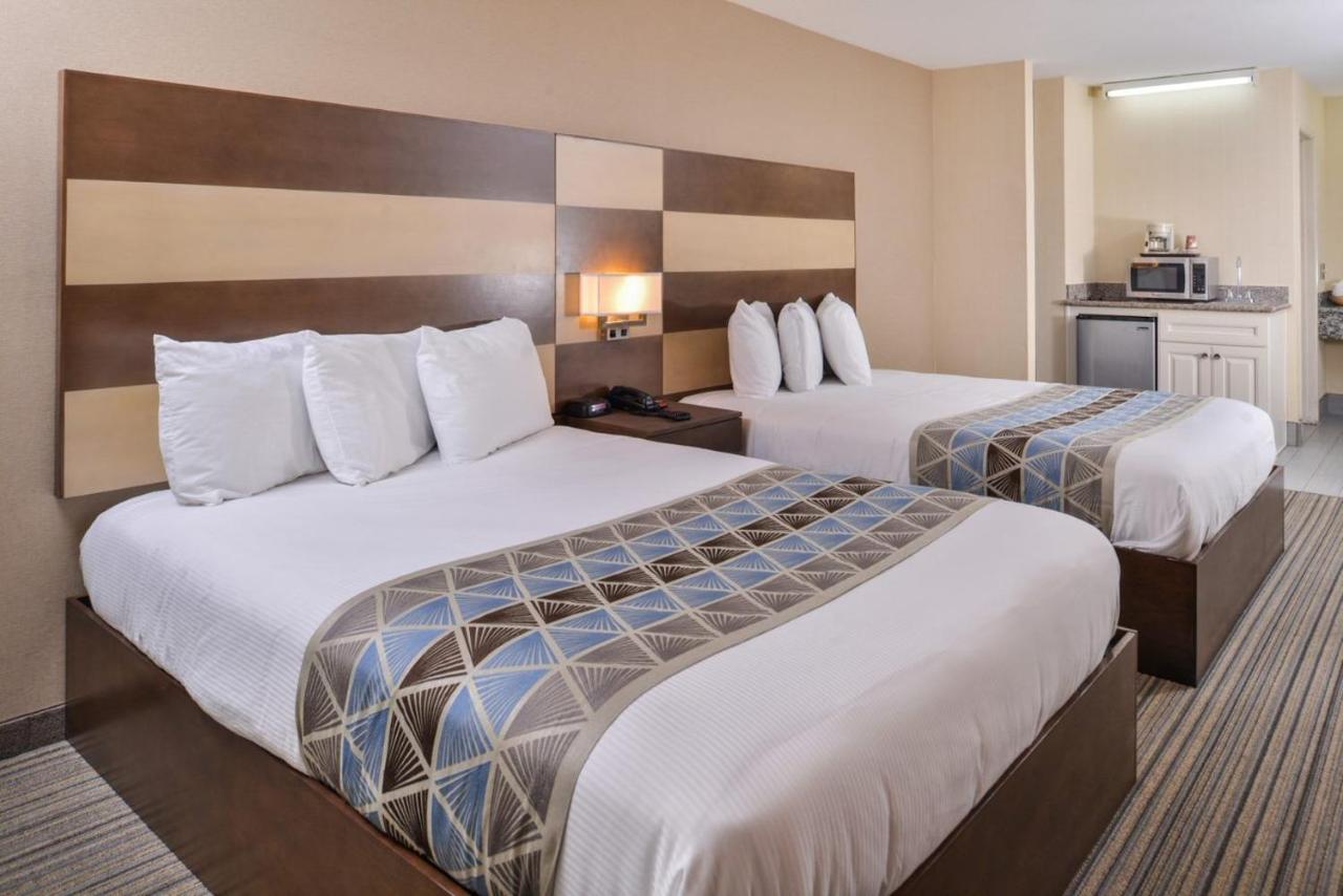 Queen Room with Two Queen Beds at Good Living Inn