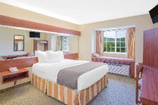 Room #74285416 at Microtel Inn & Suites by Wyndham Gassaway/Sutton