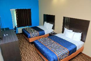 Room #325723911 at Americas Best Value Inn & Suites Prairieville