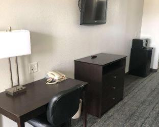Room #33873906 at Executive Inn & Suites Joaquin