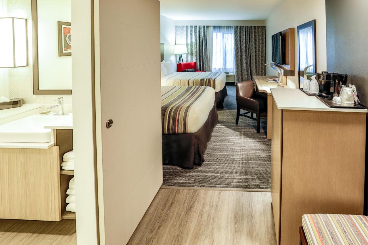 Queen Room with Two Queen Beds - Non-Smoking at Country Inn & Suites by Radisson, Nashville Airport, TN