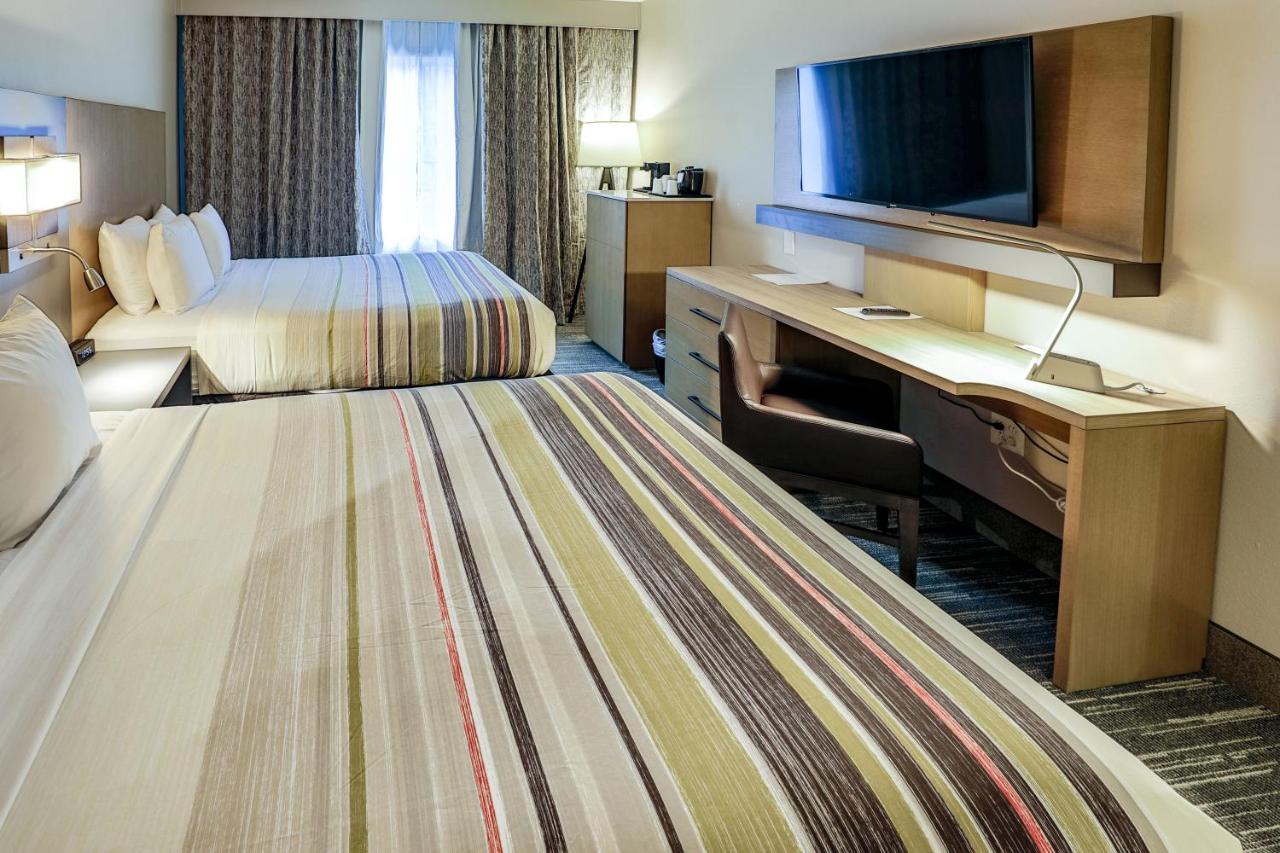 Queen Room with Two Queen Beds - Non-Smoking at Country Inn & Suites by Radisson, Nashville Airport, TN
