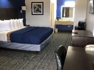 Room #33873906 at Executive Inn & Suites Joaquin