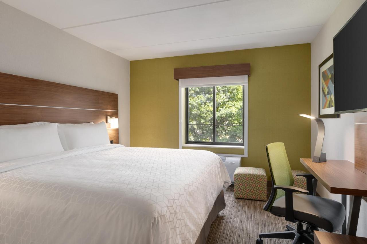 King Room with Mobility Accessible Roll-In Shower at Days Inn & Suites by Wyndham Plattsburgh