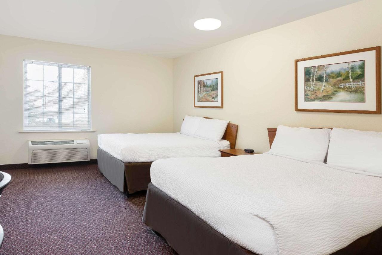 Standard Queen Room with Two Queen Beds - Non-Smoking at WoodSpring Suites Tyler Rose Garden
