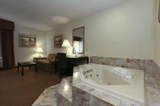 Room #53397526 at SureStay Plus Hotel by Best Western Tarboro