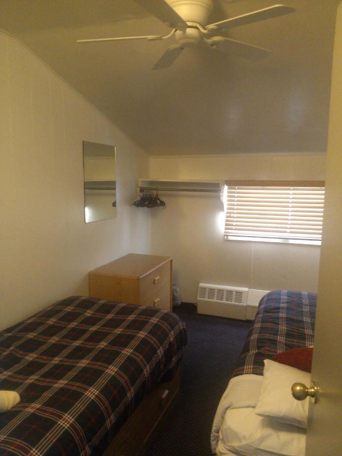 Twin Dormitory Room with Shared Bathroom at St. Moritz Lodge & Condominiums