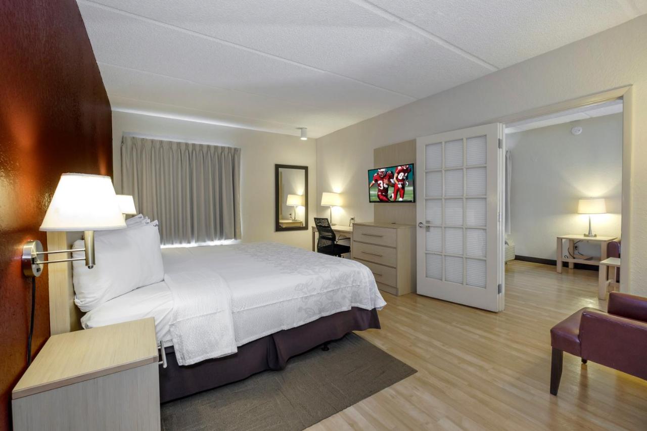 Two Room Suite with One King Bed Disability Access Smoke Free at Red Roof Inn PLUS+ Gainesville