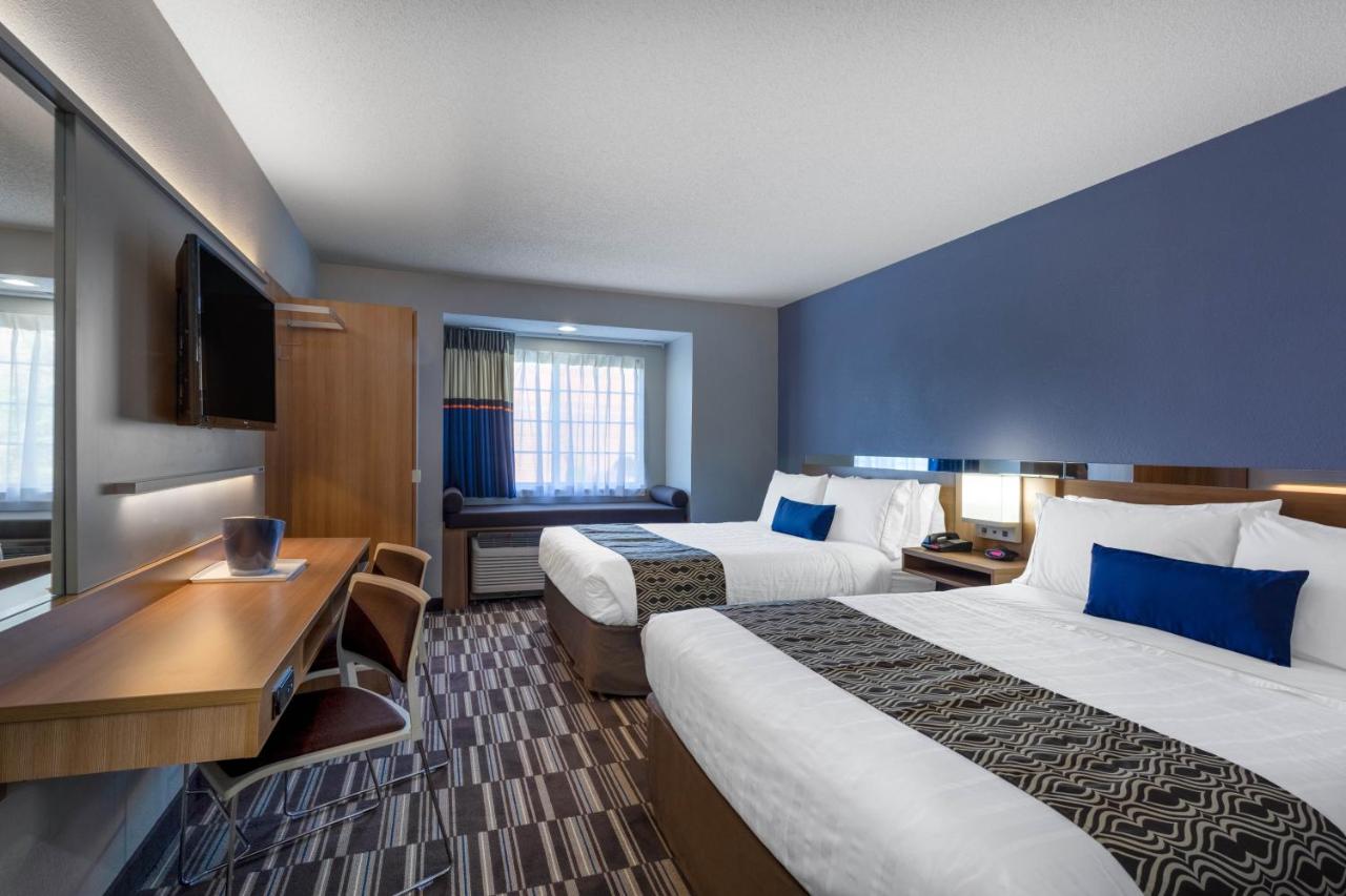 Queen Room with Two Queen Beds - Non-Smoking at Microtel Inn & Suites by Wyndham Burlington