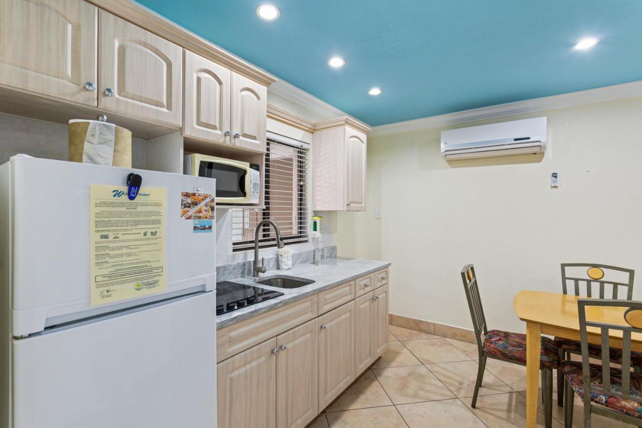 Superior Efficiency Suite: 2 Double Beds in Bedroom and 1 Sleeper Sofa at Bayview Plaza Waterfront Resort
