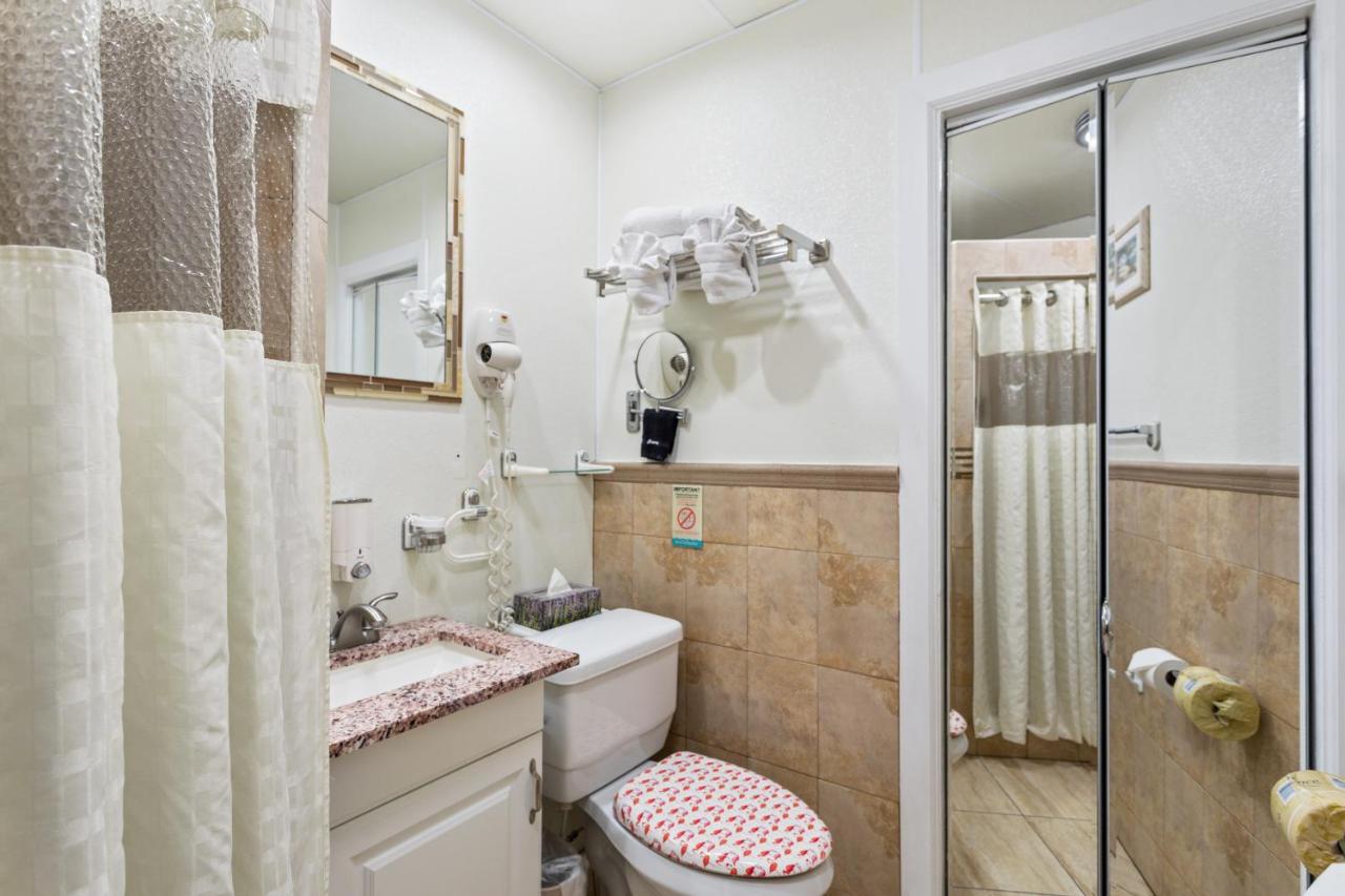 Superior Efficiency Suite: 2 Double Beds in Bedroom and 1 Sleeper Sofa at Bayview Plaza Waterfront Resort