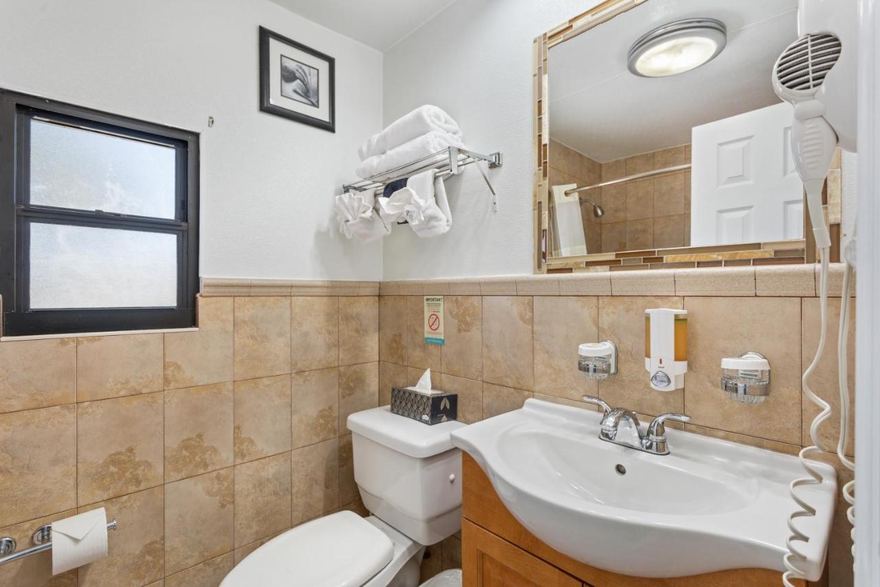 Bay Front with Balcony Suite: 1 Queen Bed and 1 Sleeper Sofa at Bayview Plaza Waterfront Resort
