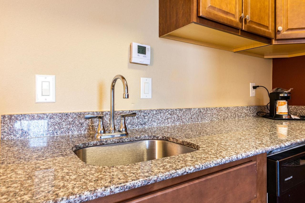 Efficiency King Suite with Kitchenette at Comfort Suites Lake Worth