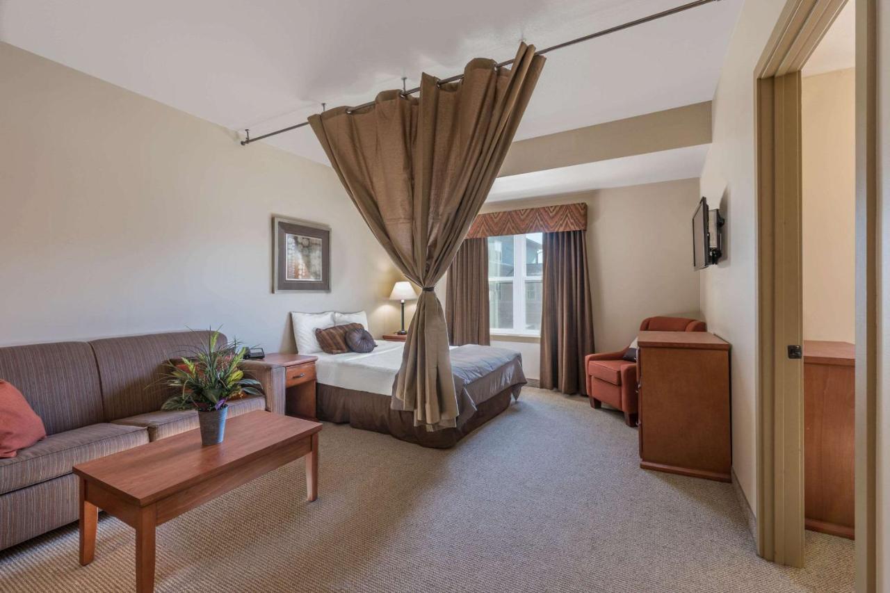 Queen Suite with Two Queen Beds and Sofa Bed - Non-Smoking at Clarion Hotel & Suites Williston