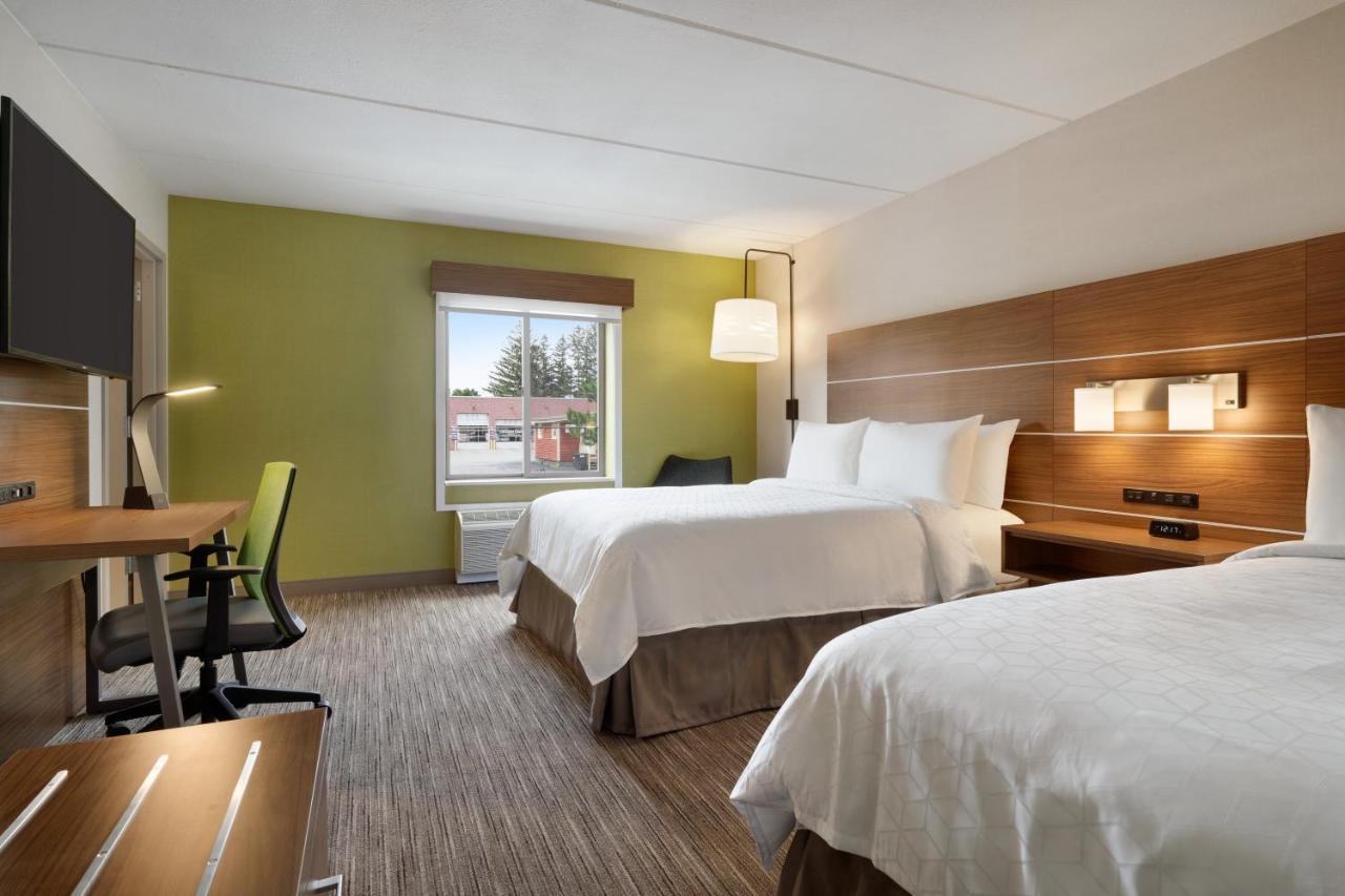 Queen Room with Two Queen Beds- Hearing Accessible Roll in Shower/Non-Smoking at Days Inn & Suites by Wyndham Plattsburgh
