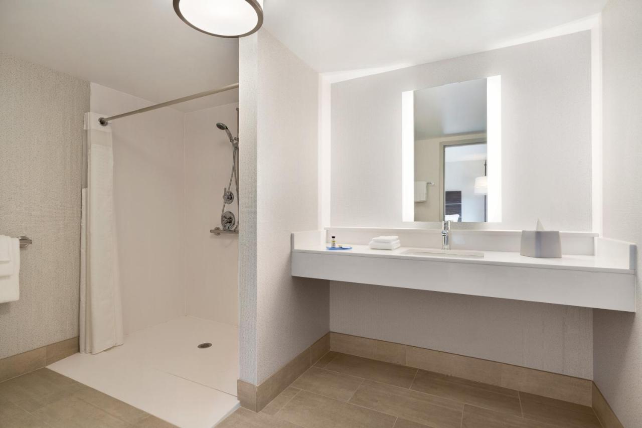 King Room with Mobility Accessible Roll-In Shower at Days Inn & Suites by Wyndham Plattsburgh