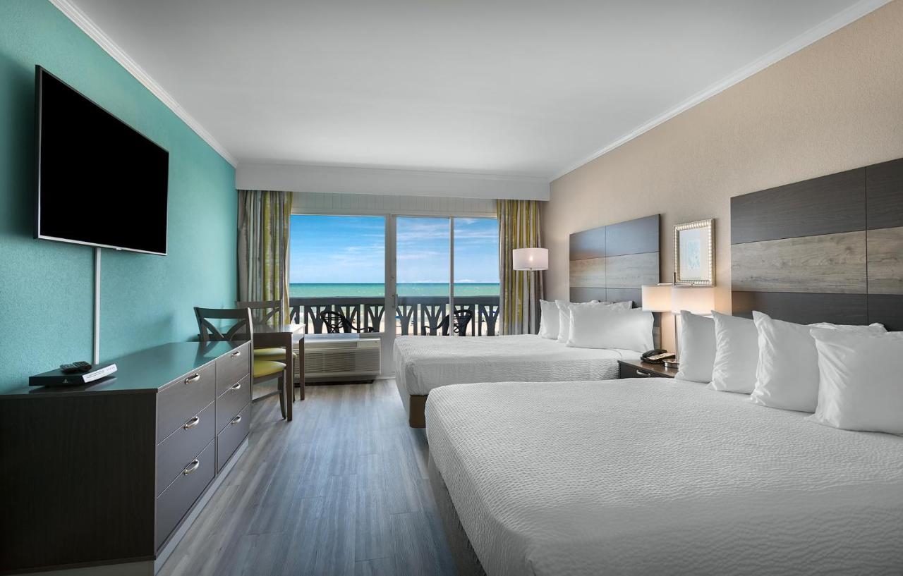Oceanfront Double Room with Two Double Beds at Caribbean Resort & Villas