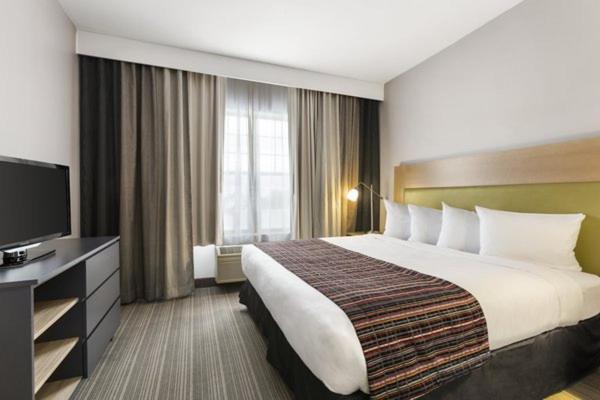 One-Bedroom King Room with Kitchenette at Country Inn & Suites by Radisson, Wausau, WI