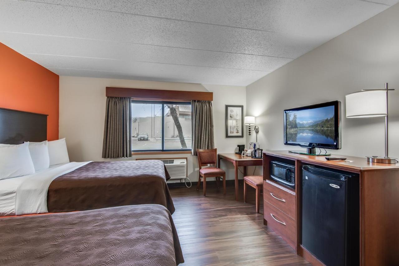 Queen Room with Two Queen Beds - Non-Smoking at AmericInn by Wyndham Coon Rapids