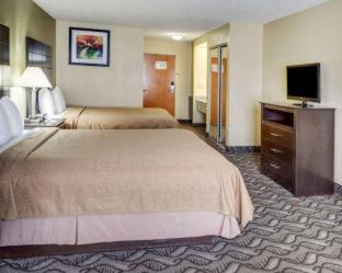 Room #45919211 at Quality Suites Baton Rouge East - Denham Springs