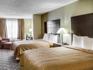 Room #45919211 at Quality Suites Baton Rouge East - Denham Springs