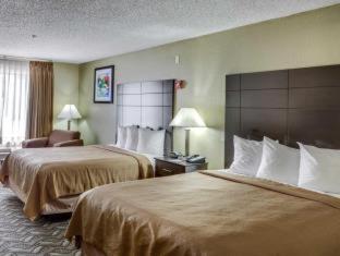 Room #45919211 at Quality Suites Baton Rouge East - Denham Springs