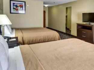 Room #45919211 at Quality Suites Baton Rouge East - Denham Springs