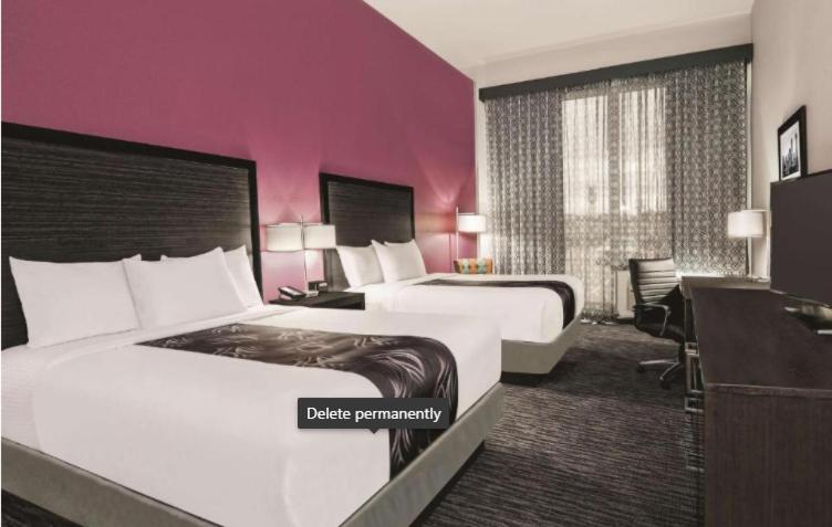 Queen Room with Two Queen Beds and Bath Tub - Mobility/Hearing Accessible - Non-Smoking at La Quinta Inn & Suites by Wyndham Dallas Grand Prairie North