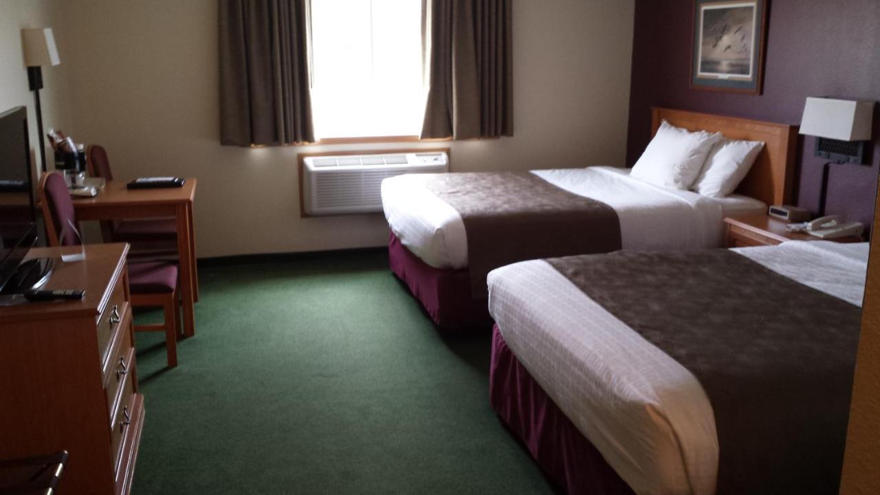 Queen Room with Two Queen Beds - Non-Smoking at AmericInn by Wyndham Madison SD