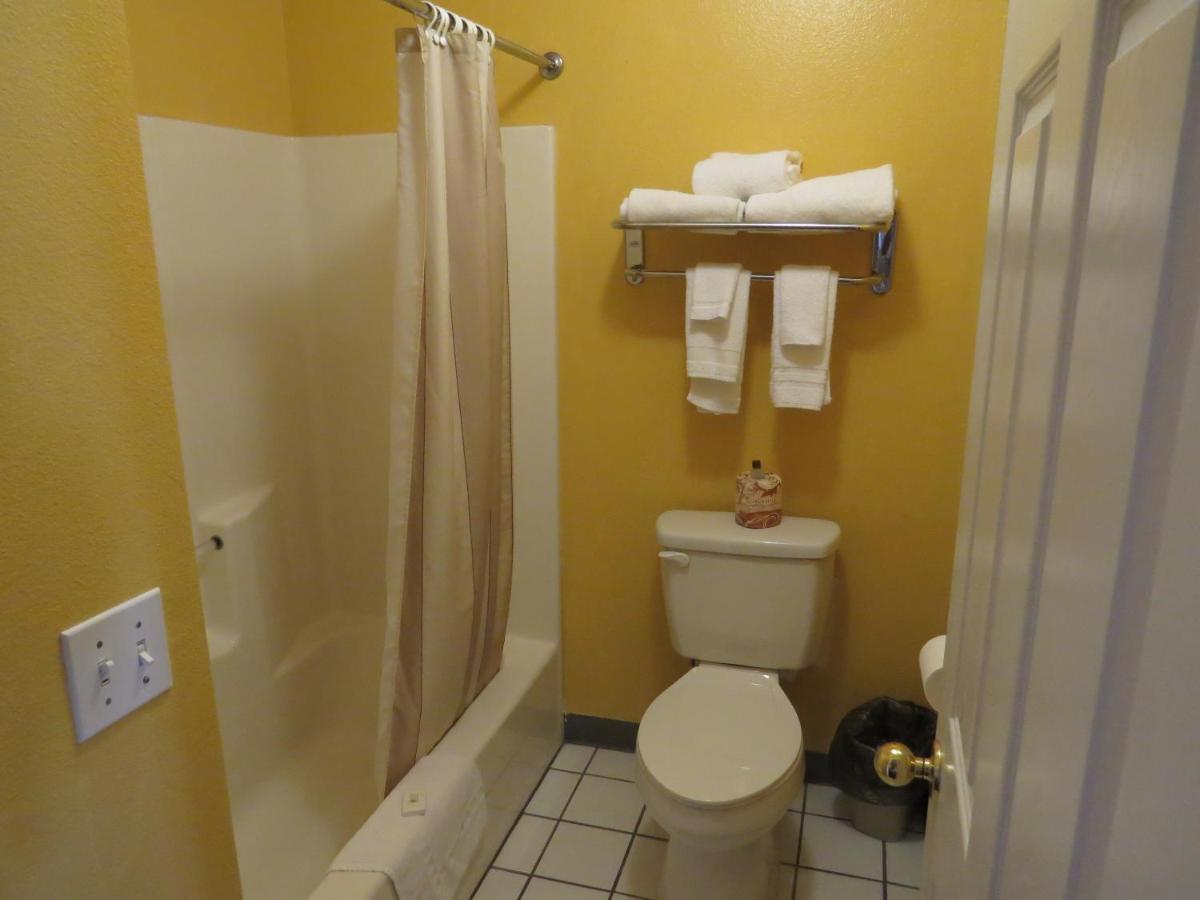 Queen Room with Two Queen Beds - Non-Smoking at America's Best Inn & Suites