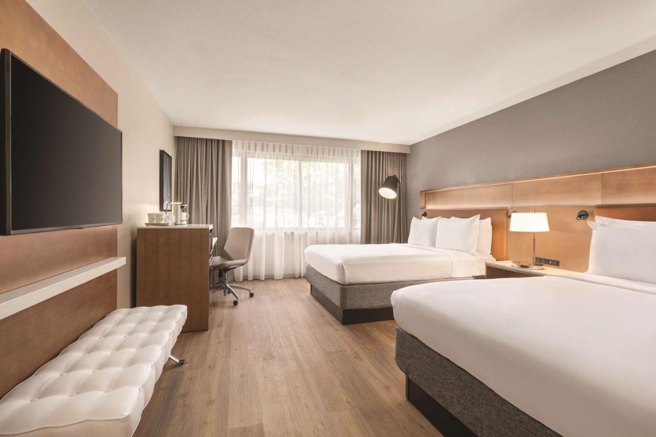 Business Queen Room with Two Queen Beds - Non-Smoking at Ramada by Wyndham West Sacramento Hotel and Suites