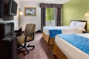 Room #450512645 at Travelodge by Wyndham Zanesville