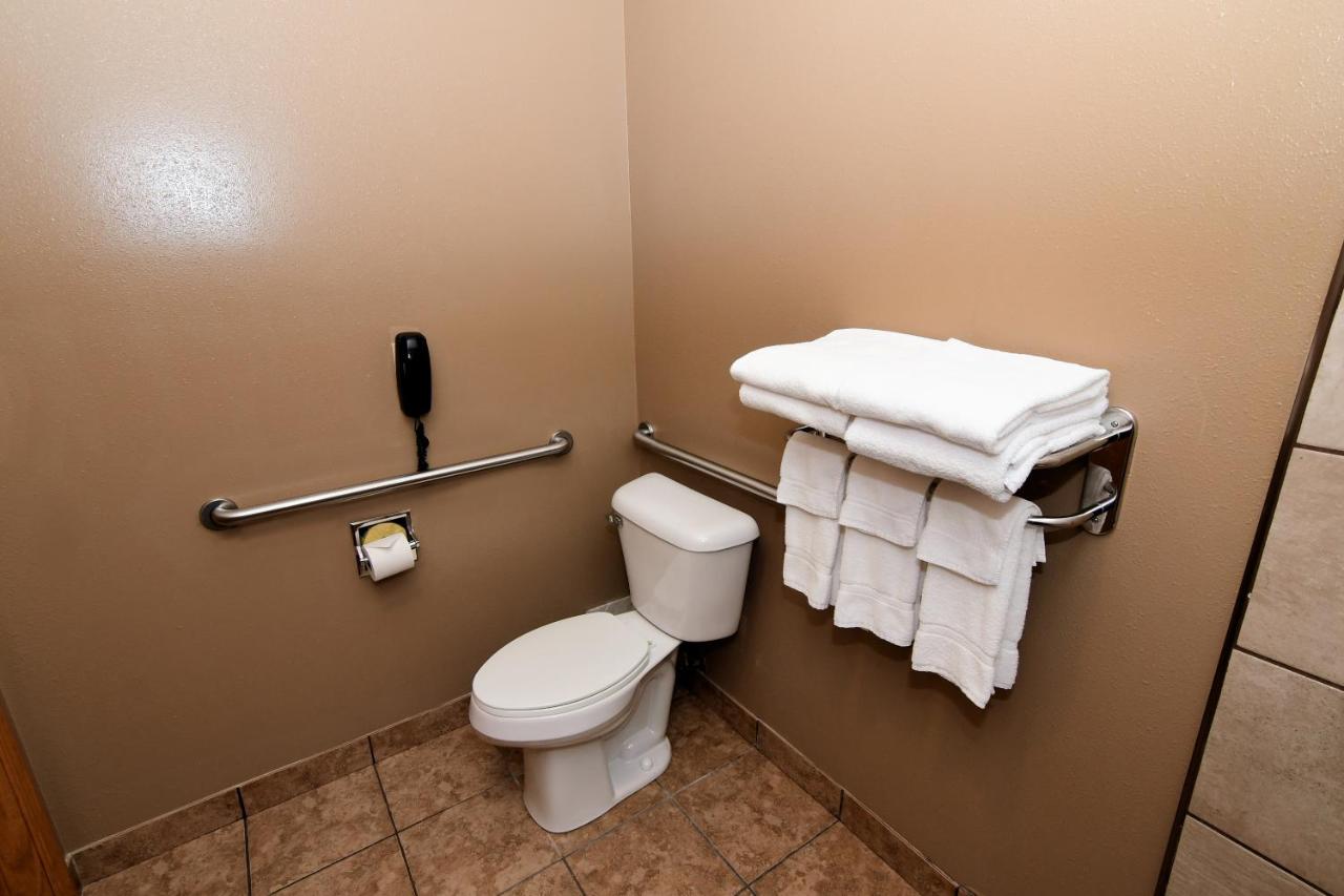 King Room with Roll-In Shower - Disability Access at Cobblestone Inn & Suites - Denison Majestic Hills