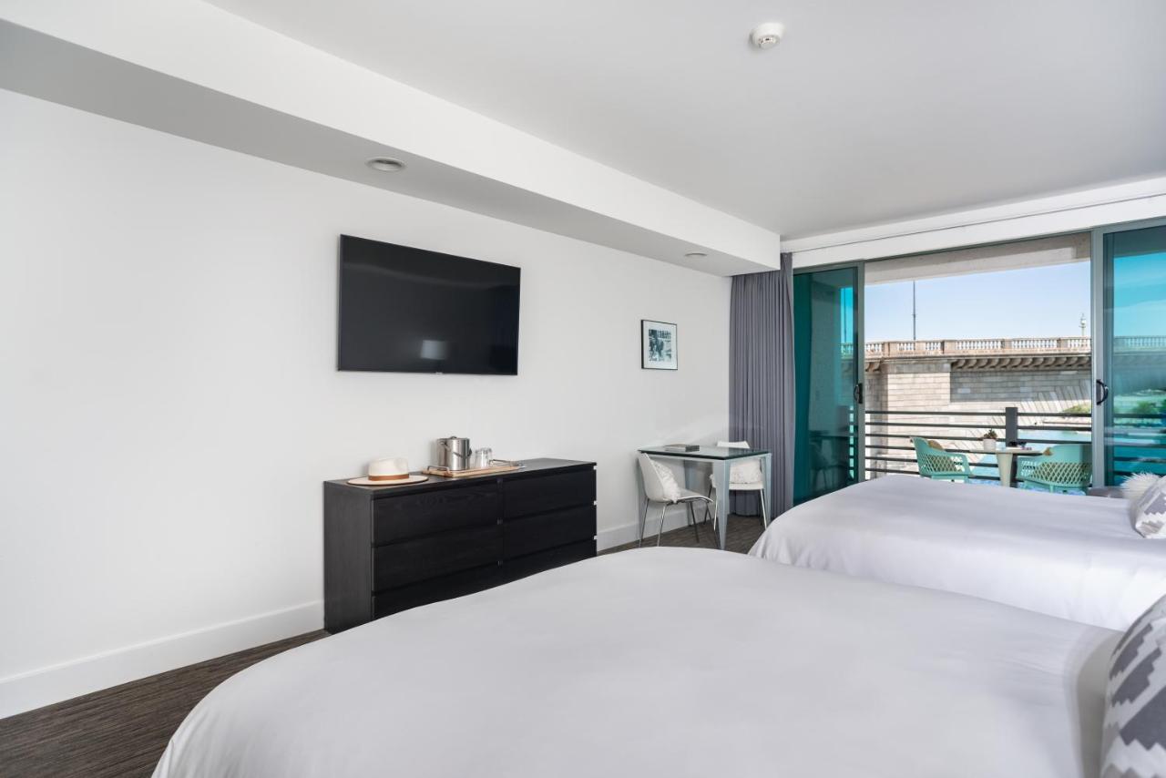 Luxury Queen Room with Two Queen Beds at Heat Hotel