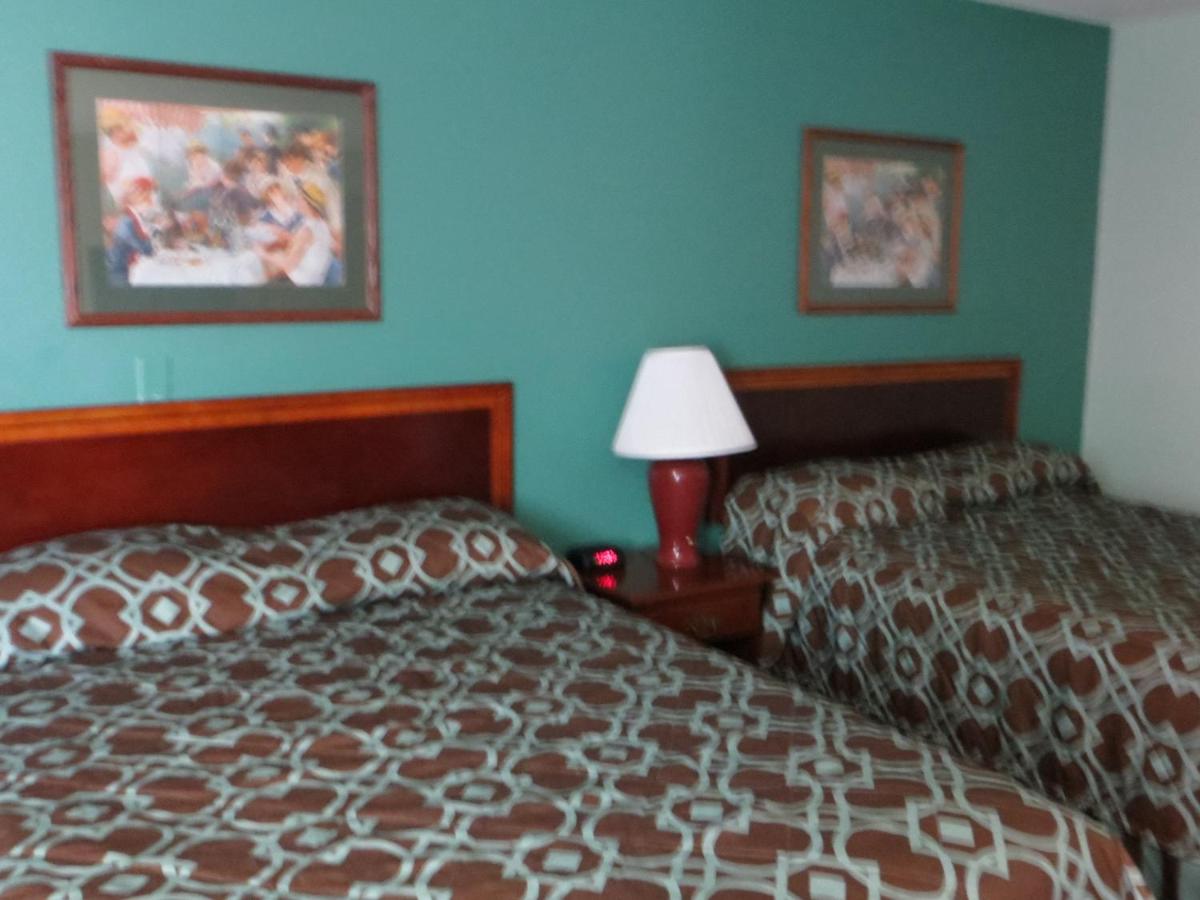 Queen Room with Two Queen Beds - Non-Smoking at Super 8 by Wyndham Hudson