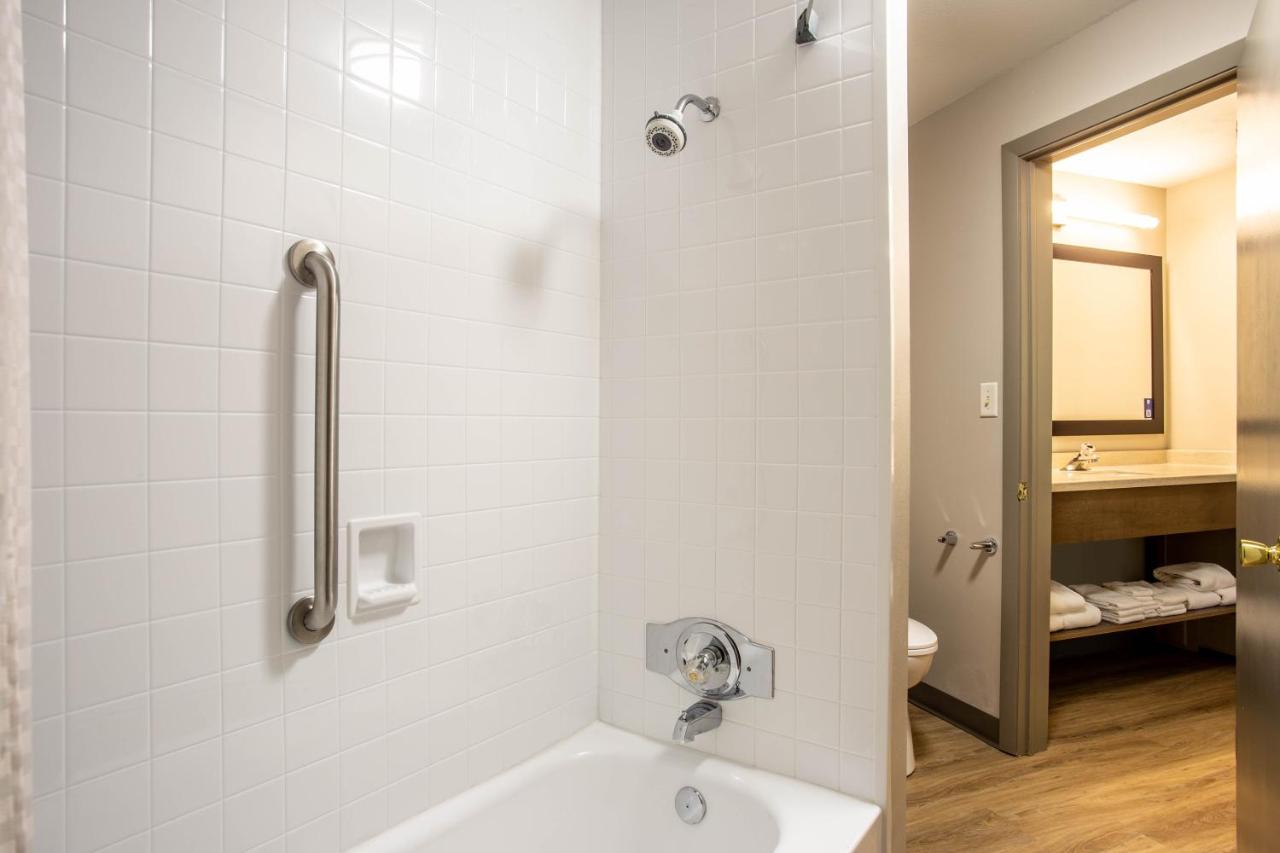 Studio Suite with Three Queen Beds - Non-Smoking at Days Inn by Wyndham Marquette