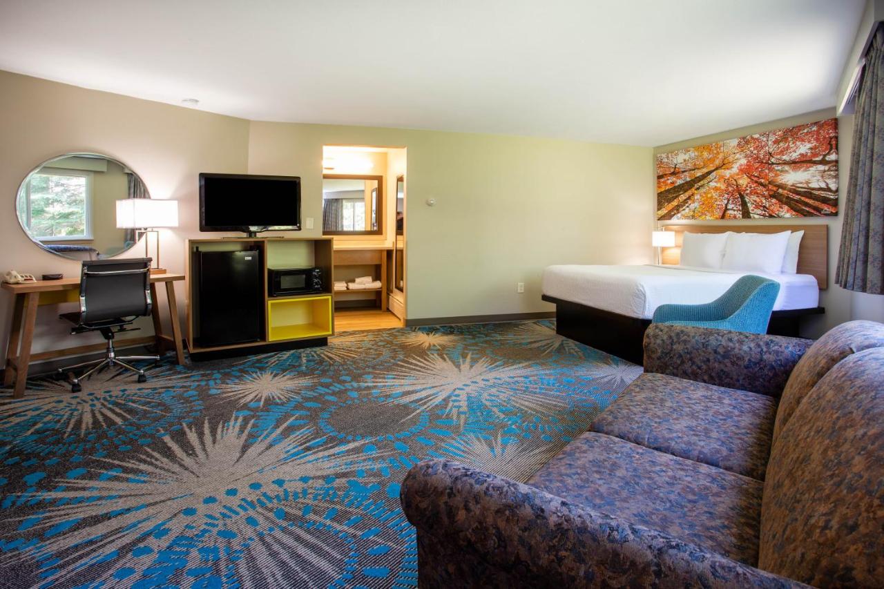 Studio Suite with Three Queen Beds - Non-Smoking at Days Inn by Wyndham Marquette