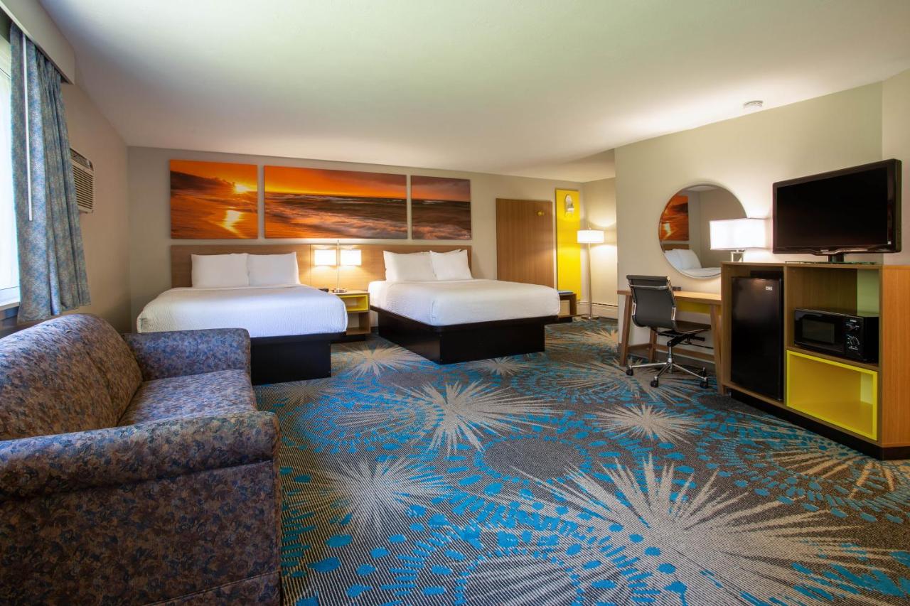 Studio Suite with Three Queen Beds - Non-Smoking at Days Inn by Wyndham Marquette