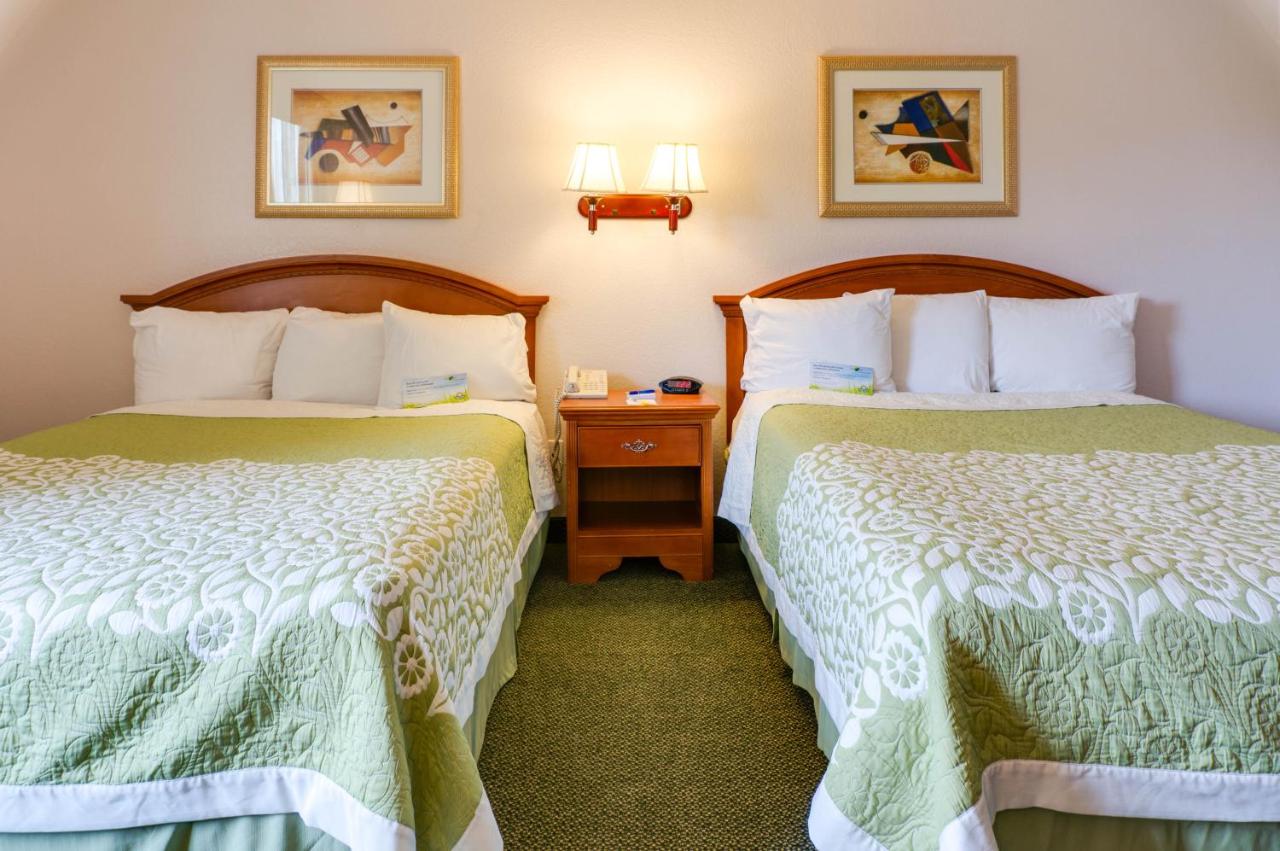 Queen Room with Two Queen Beds - Smoking at Days Inn & Suites by Wyndham Fullerton