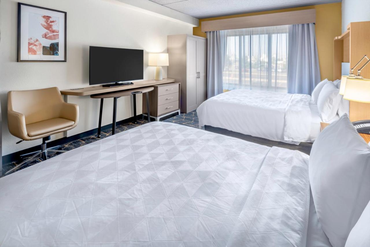 Queen Suite with Two Queen Beds Poolside- Non-Smoking at Holiday Inn & Suites Wausau-Rothschild by IHG