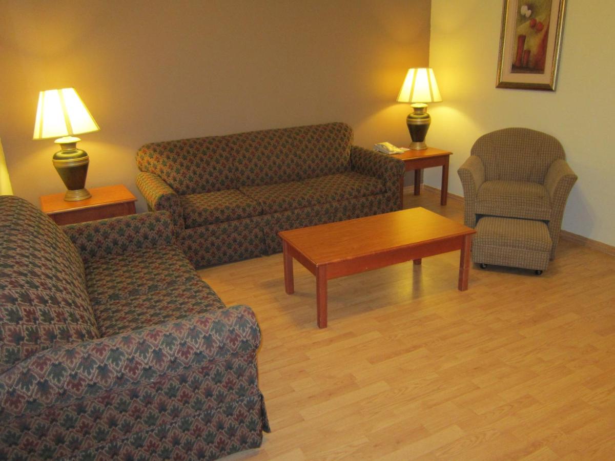 Queen Suite with Two Queen Beds and Sofa Bed at Quality Inn Jacksonville - Orange Park near Naval Air Station