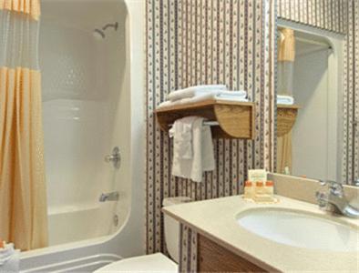 Deluxe King Room - Non-Smoking at Days Inn by Wyndham Rapid City