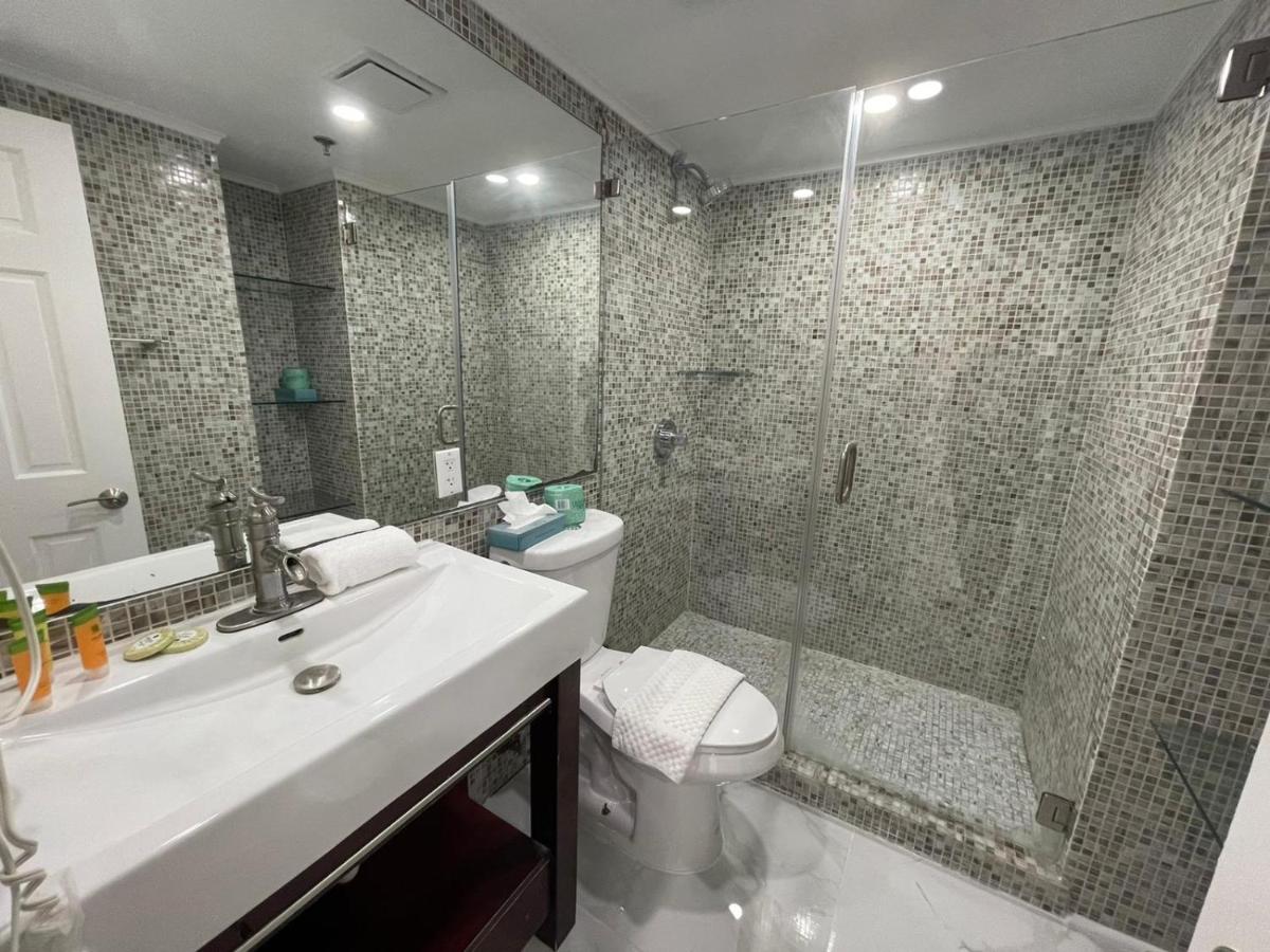 Signature Two-Bedroom 1 King + 2 Twin Beds at Alexander by Design Suites