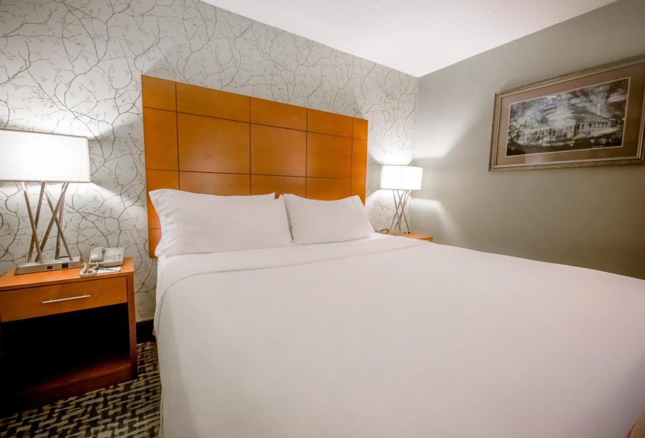 Queen Room with Two Queen Beds at Holiday Inn Raleigh Downtown - Capital, an IHG Hotel