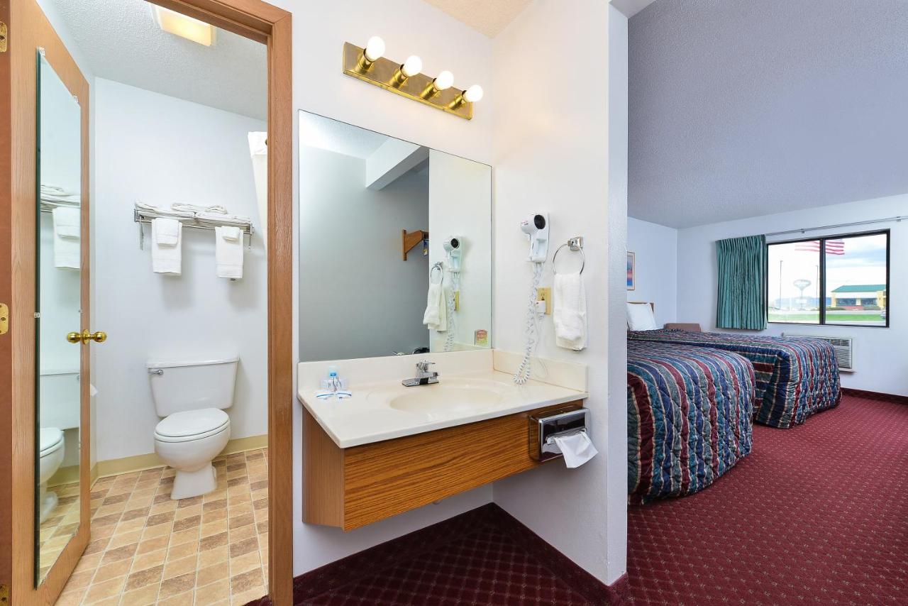 Queen Room with Two Queen Beds - Non-Smoking at Travelodge by Wyndham Spearfish